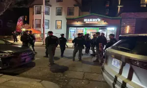 Suspect at large in Brown University shooting that kills 2, injures 8 Suspect at large in Brown University shooting that kills 2, injures 8