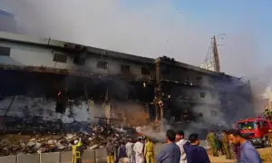 Gul Plaza fire rages on after 34 hours; nine dead, 65 missing