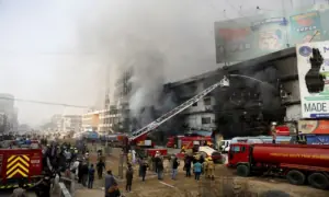 Gul Plaza fire rages on after 34 hours; fourteen dead, 65 missing