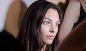 Vittoria Ceretti stuns in white gown carrying Italian flag at Winter Olympics