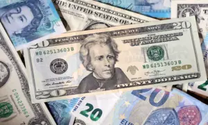 Dollar dips as court ruling upends US tariff wall