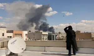 Israel strikes Tehran, Iran retaliates with missile attacks