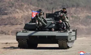 North Korean leader&rsquo;s teenage daughter drives tank in latest public appearance
