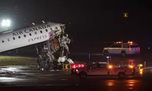 Air Canada jet collides with fire truck at LaGuardia, killing both pilots Air Canada jet collides with fire truck at LaGuardia, killing both pilots