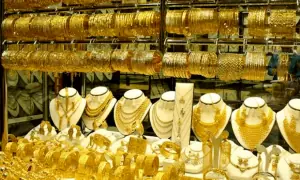Gold and silver prices climb after oil surge