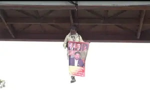 Man rescued after hanging from Karachi bridge in dramatic protest