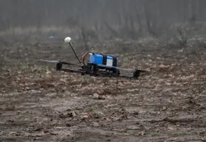 Ukrainian drone strike hits apartments, kills two adults and child, officials say