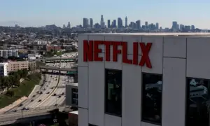 Netflix shares fall after downbeat revenue forecast, co-founder to leave