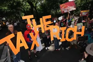 Stars embrace costume at Met Gala as protesters target Bezos
