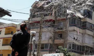 Israel says it killed Hezbollah commander in first strike on Beirut since ceasefire
