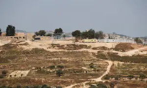 Israeli settlers force re-burial of Palestinian man in West Bank