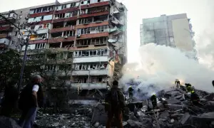 Russia pummels Kyiv, killing at least 10 and denting peace hopes