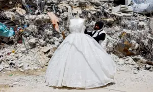 In war‑scarred Gaza, brides turn to refurbished wedding dresses In war‑scarred Gaza, brides turn to refurbished wedding dresses