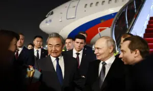 Putin lands in China for trip that aims to show unshakeable ties after Trump pomp