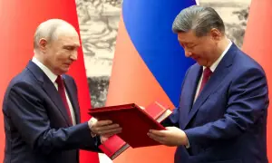 Putin, Xi hail 'unyielding' ties in talks after Trump visit