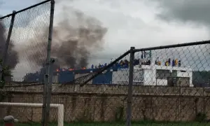 Venezuelan inmates take to prison roof to protest shootings, abuse