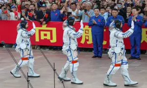 China sends three astronauts to space station on landmark mission China sends three astronauts to space station on landmark mission