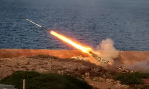 Iran launches missile and drone attacks on Bahrain, Kuwait