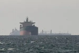 Iran says it fired warning missiles and drones at US warships in Gulf of Oman