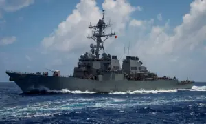 Iran says it fired warning missiles and drones at US warships in Gulf of Oman