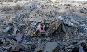 Israeli military kills four in Gaza and expands control zone, locals say