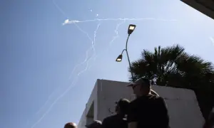 Iran halts Israel attacks as Trump urges calm