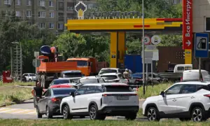 Cossacks, volunteers help keep order at petrol stations in Russian Black Sea resort