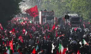 Mourners fill Tehran streets as Khamenei's coffin moves through capital