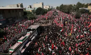 Millions throng Tehran for Khamenei funeral as procession pauses for crowds Millions throng Tehran for Khamenei funeral as procession pauses for crowds