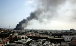 Iran says missiles, drones strike four US bases in Kuwait, Bahrain