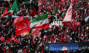 Iran says it hits US military targets in Gulf, lays slain leader to rest