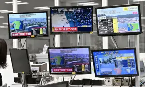 Japan quake injures at least 50, disrupts power and travel