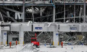 Japan quake toll rises to 13 as rescuers haul people from collapsed mall