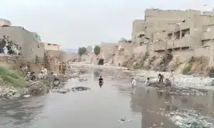 Karachi rescue operation enters second day after boy swept away in Lyari River Karachi rescue operation enters second day after boy swept away in Lyari River