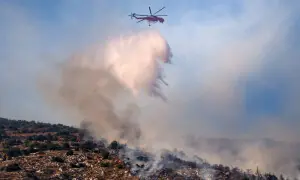 New blazes in Greece as strong winds hamper firefighting