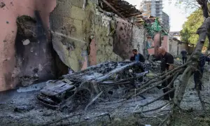 Russia pounds Kyiv with missiles, killing at least nine