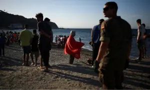 Spain's Ceuta overwhelmed as thousands remain after migrant border rush