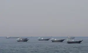 Iran says has agreed new Hormuz route with Oman