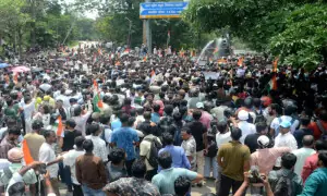 Indian police fire tear gas, use batons as youth protest exam leaks