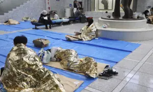 Thousands stranded at Japan's Narita airport after record rain kills four