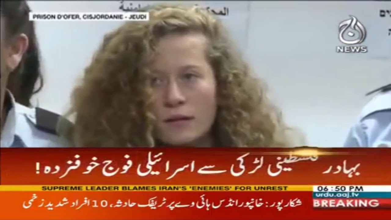 Palestinian girl filmed slapping Israeli soldier is charged with assault
