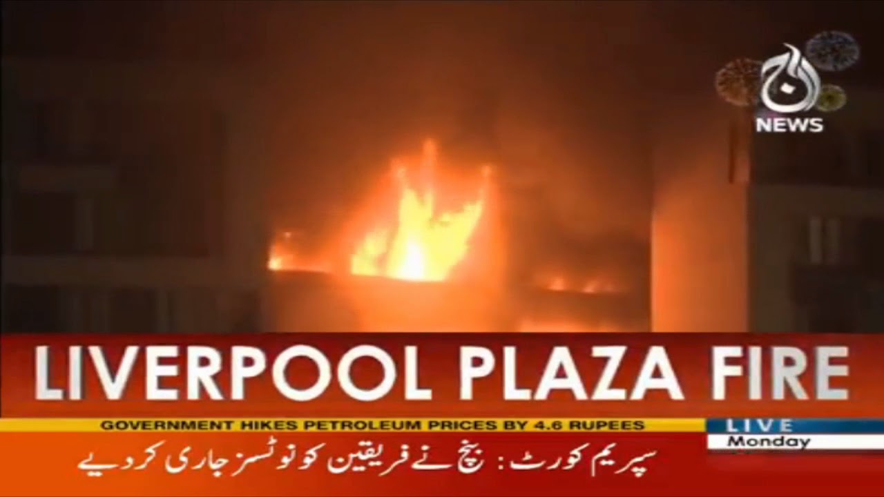 Parking plaza fire destroys 1600 vehicles in liverpool  | Aaj News