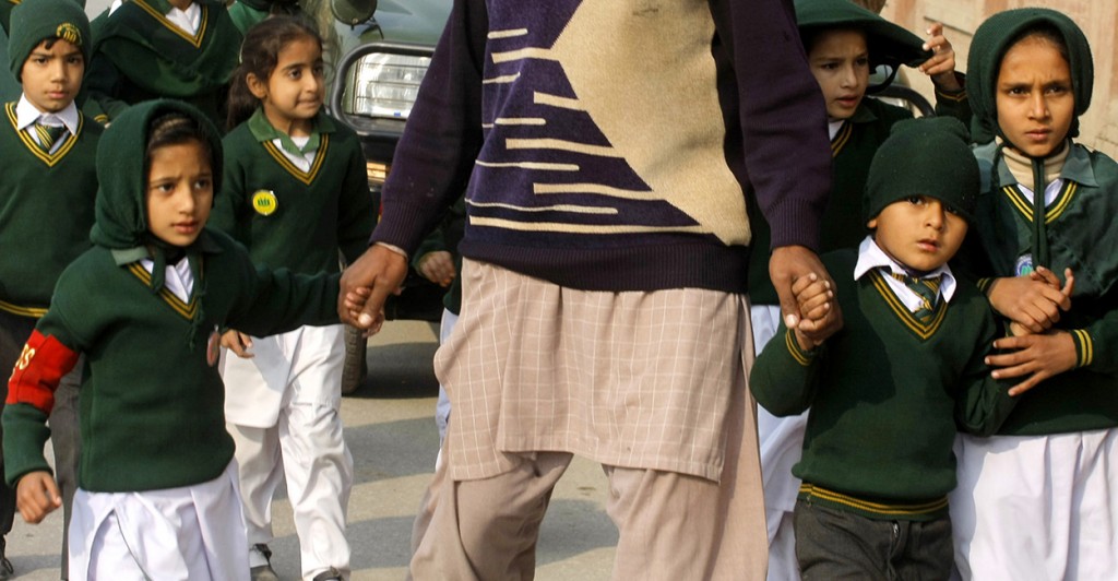Children are escorted from a school in Peshawar, Pakistan after an attack by Taliban gunmen on on December 16, 2014. Taliban insurgents killed more than 120, mostly students, in a morning terrorist attack on the military-run school in northwest Pakistan. UPI/Sajjad Ali Queshi (Newscom TagID: upiphotostwo352775.jpg) [Photo via Newscom]